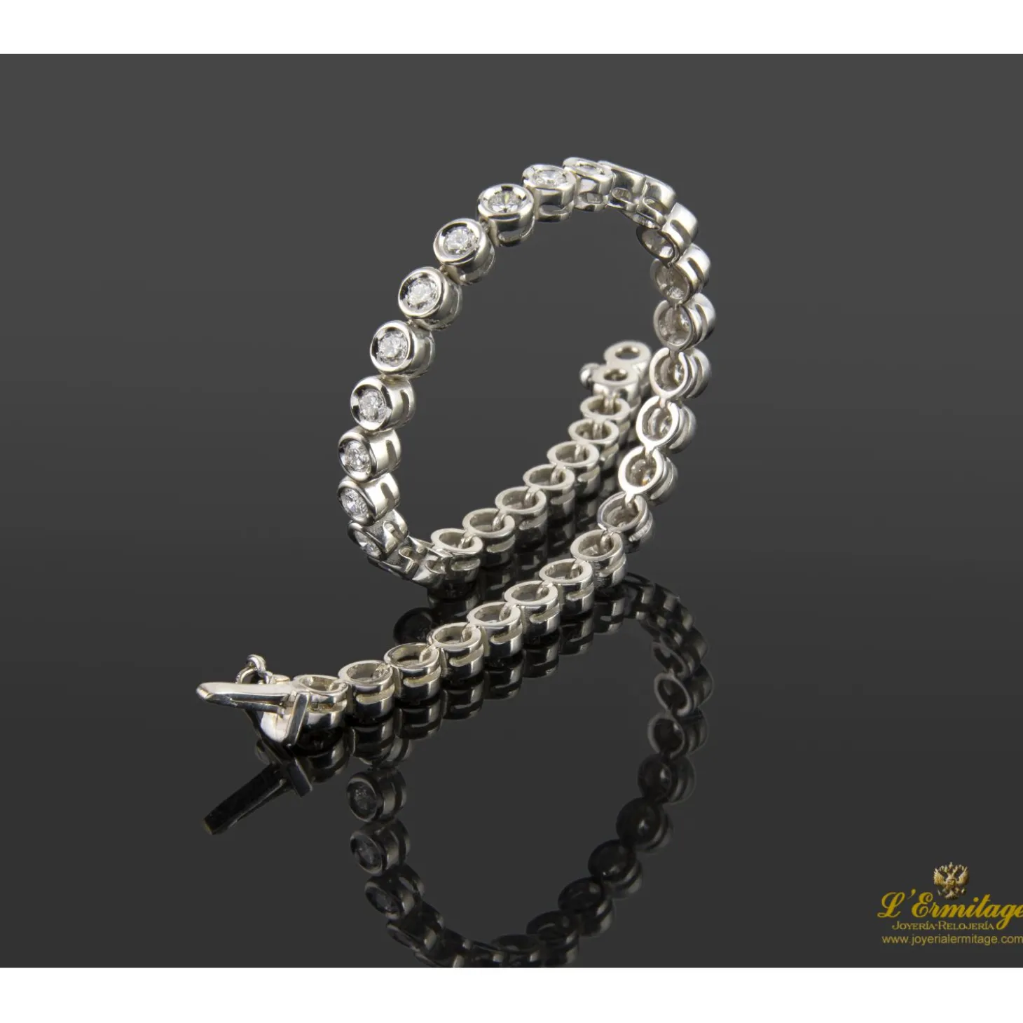 PULSERAS Pulsera riviere chatones oro blanco brillantes.