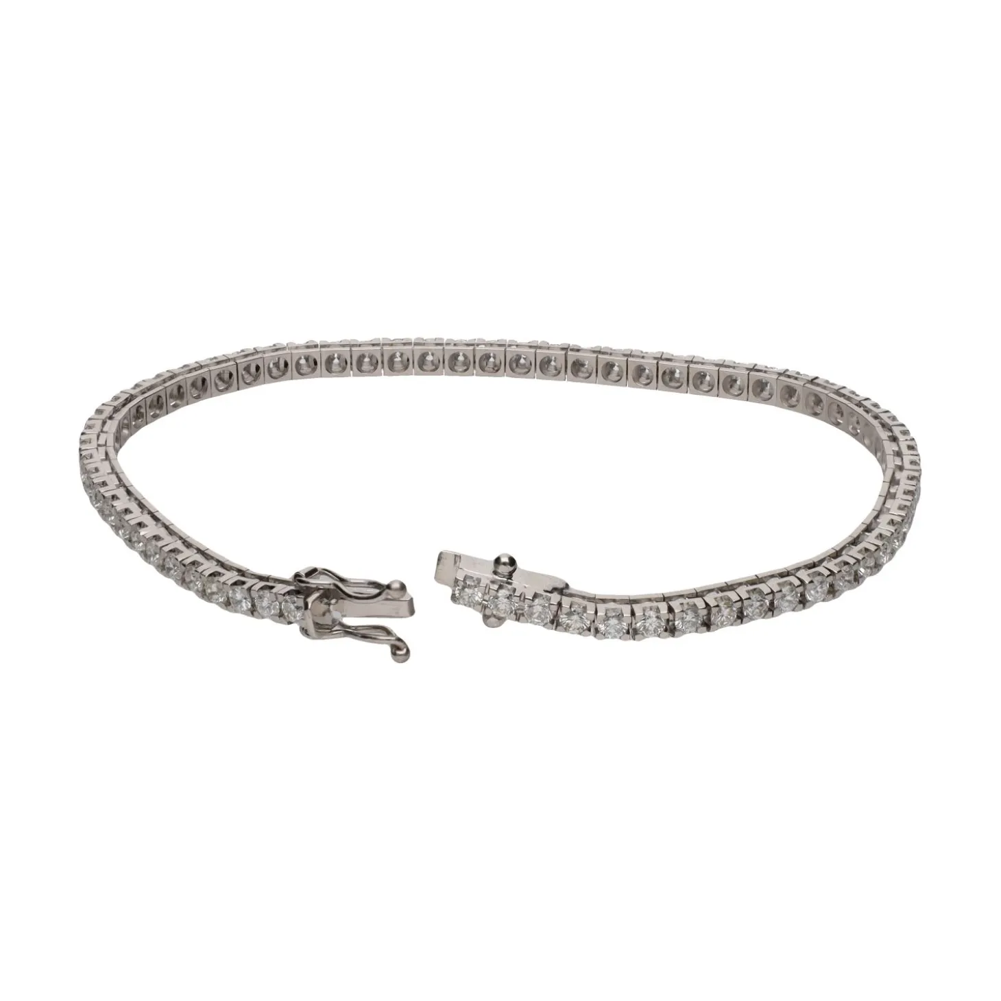 PULSERAS Pulsera riviere en oro blanco con brillantes.