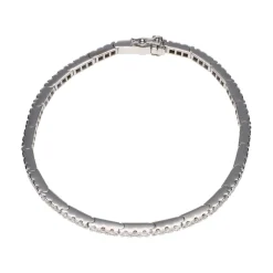PULSERAS Pulsera riviere en oro blanco y brillantes.