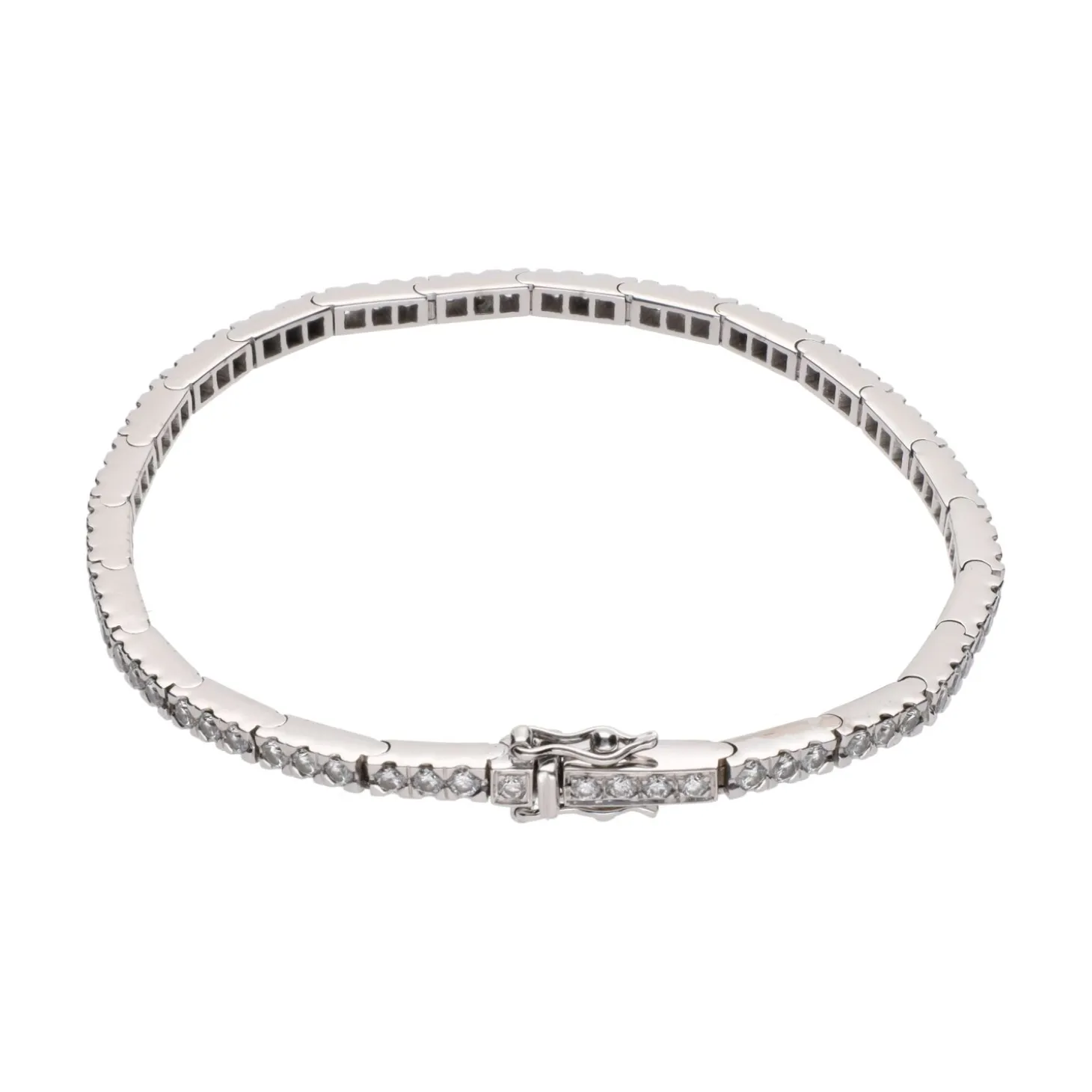 PULSERAS Pulsera riviere en oro blanco y brillantes.
