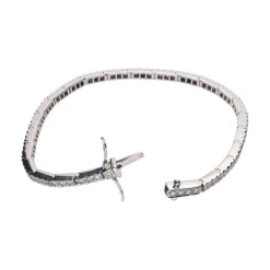 PULSERAS Pulsera riviere en oro blanco y brillantes.