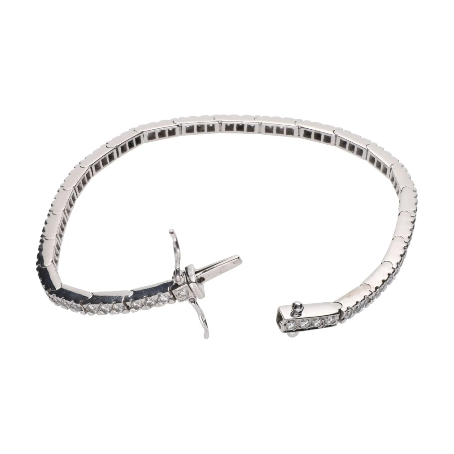PULSERAS Pulsera riviere en oro blanco y brillantes.