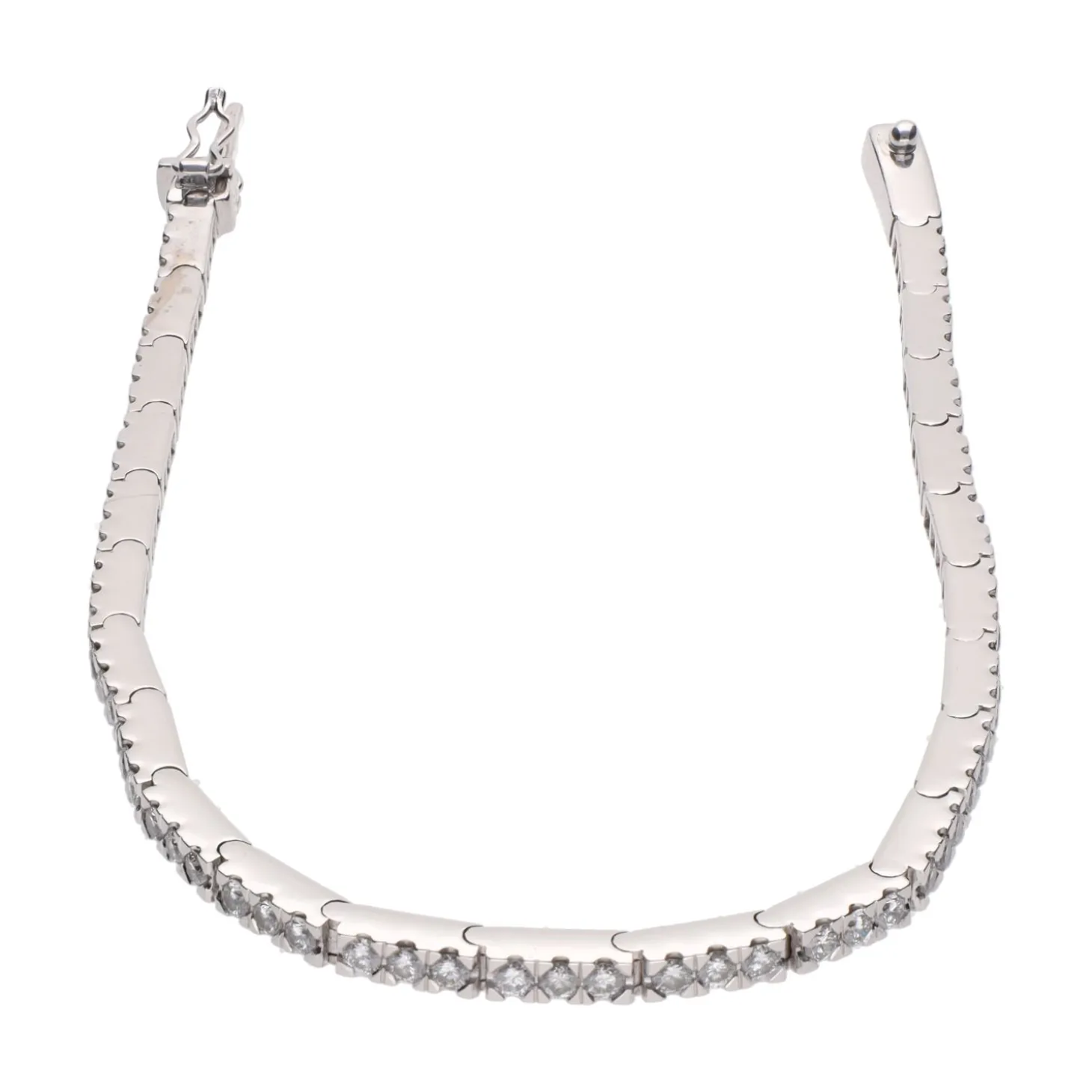 PULSERAS Pulsera riviere en oro blanco y brillantes.