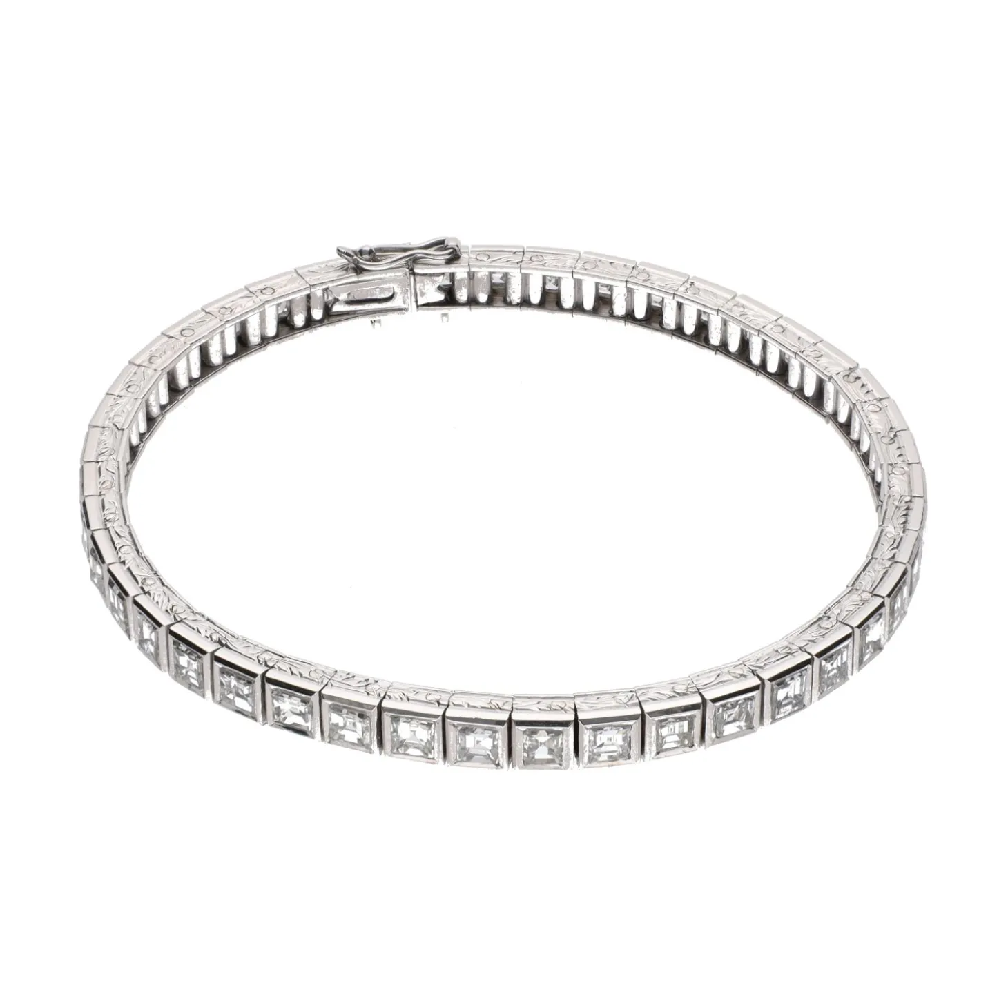 PULSERAS Pulsera riviere en oro blanco y diamantes naturales.