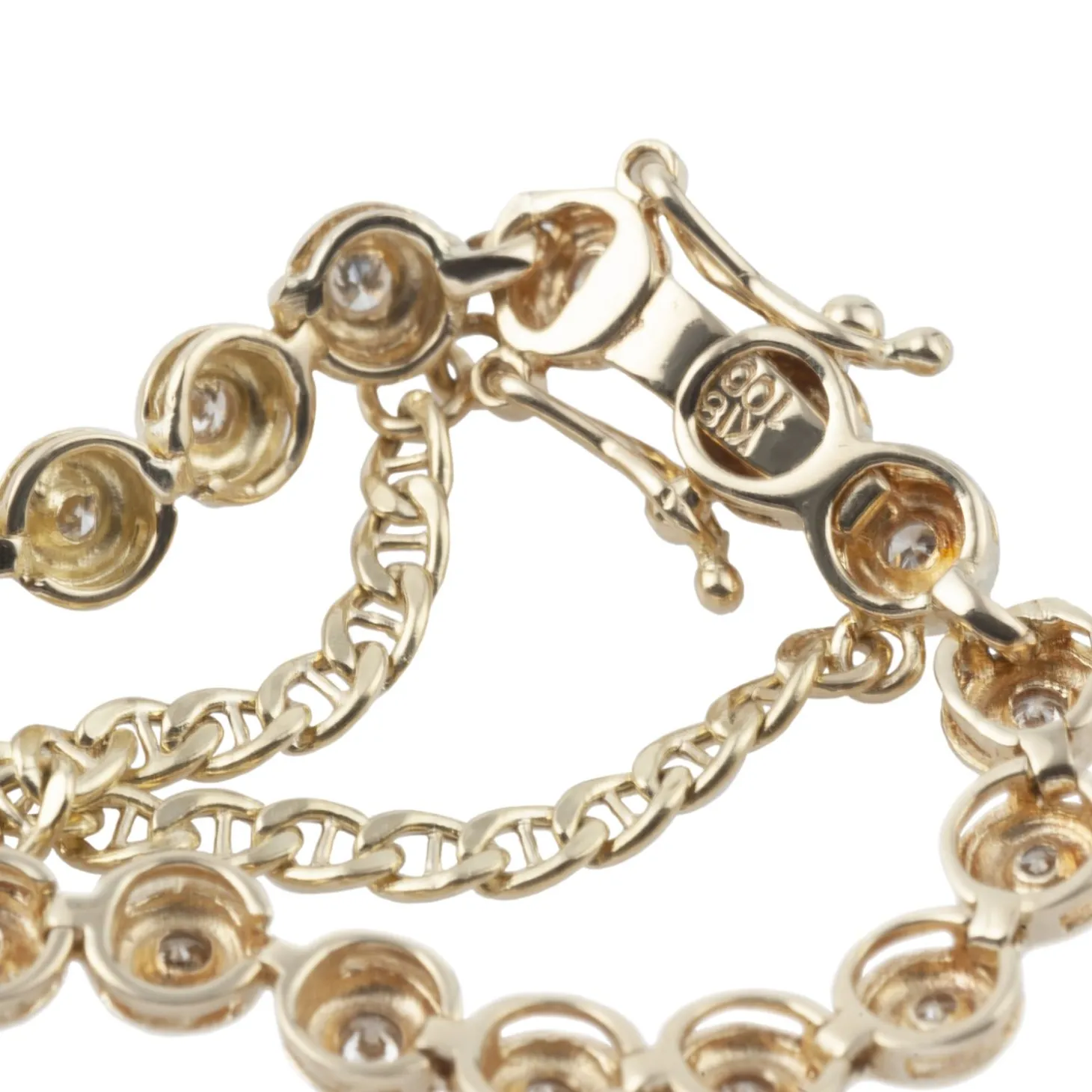 PULSERAS Pulsera riviere en oro amarillo y brillantes.