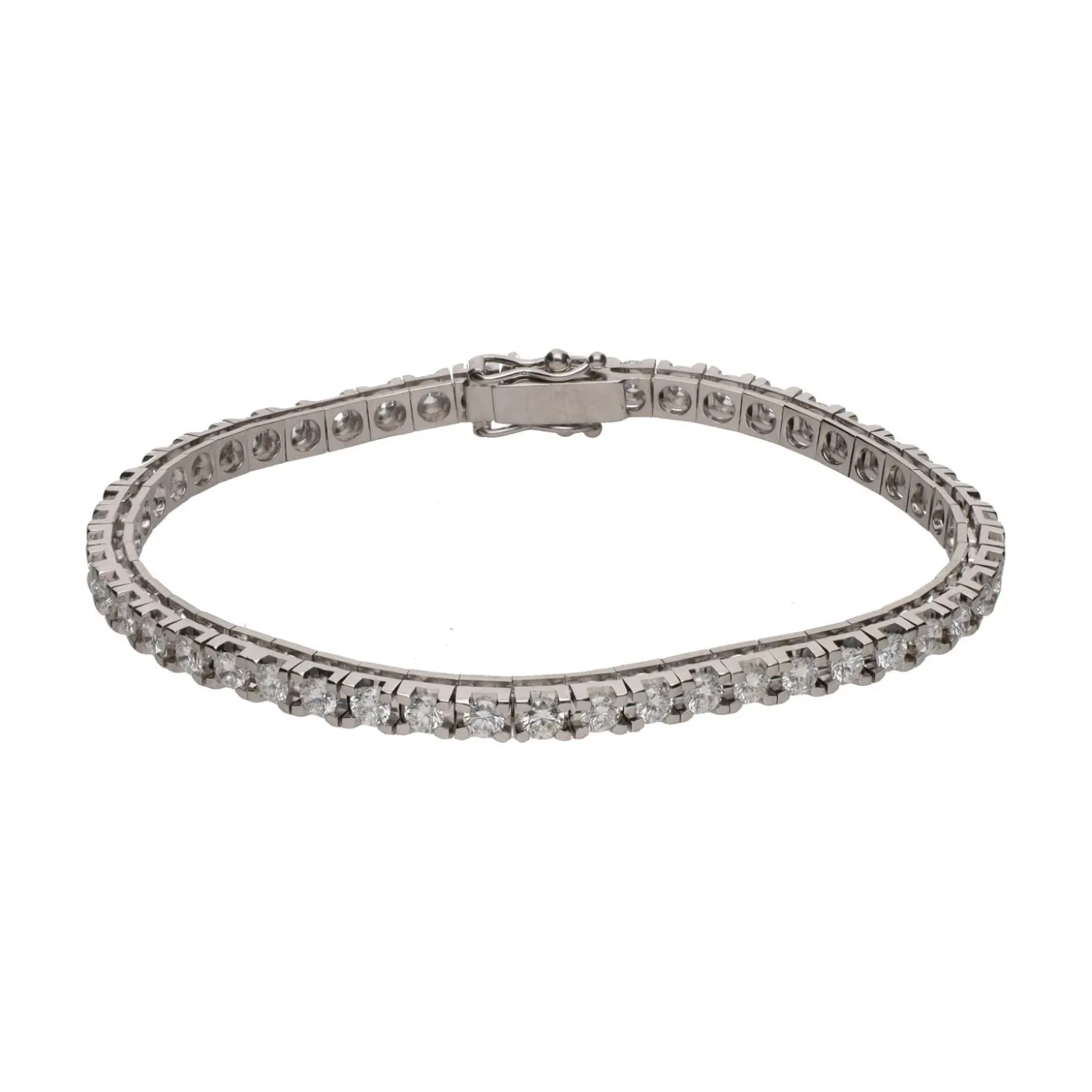 PULSERAS Pulsera riviere en oro blanco con brillantes.