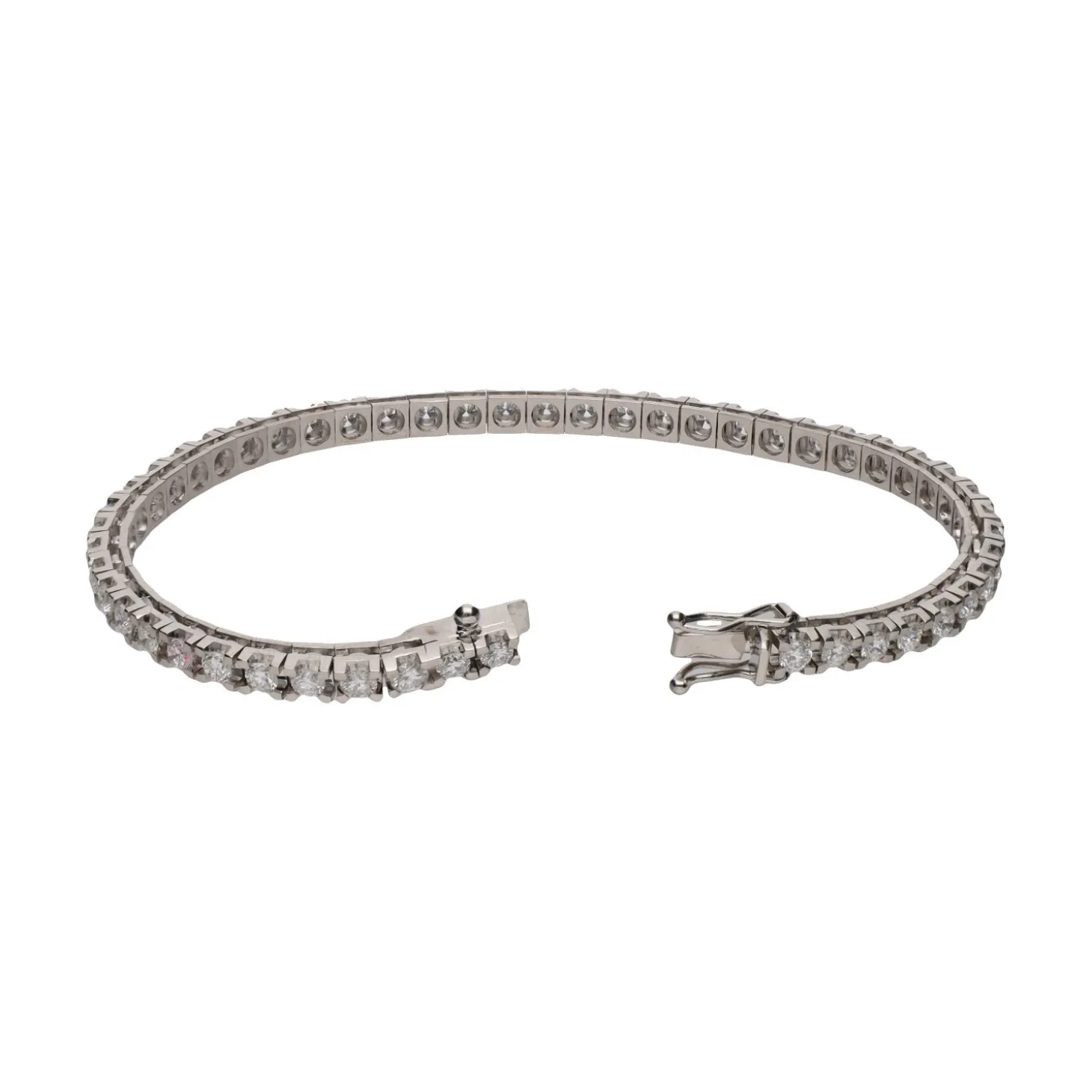 PULSERAS Pulsera riviere en oro blanco con brillantes.