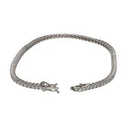 PULSERAS Pulsera riviere en oro blanco con brillantes.
