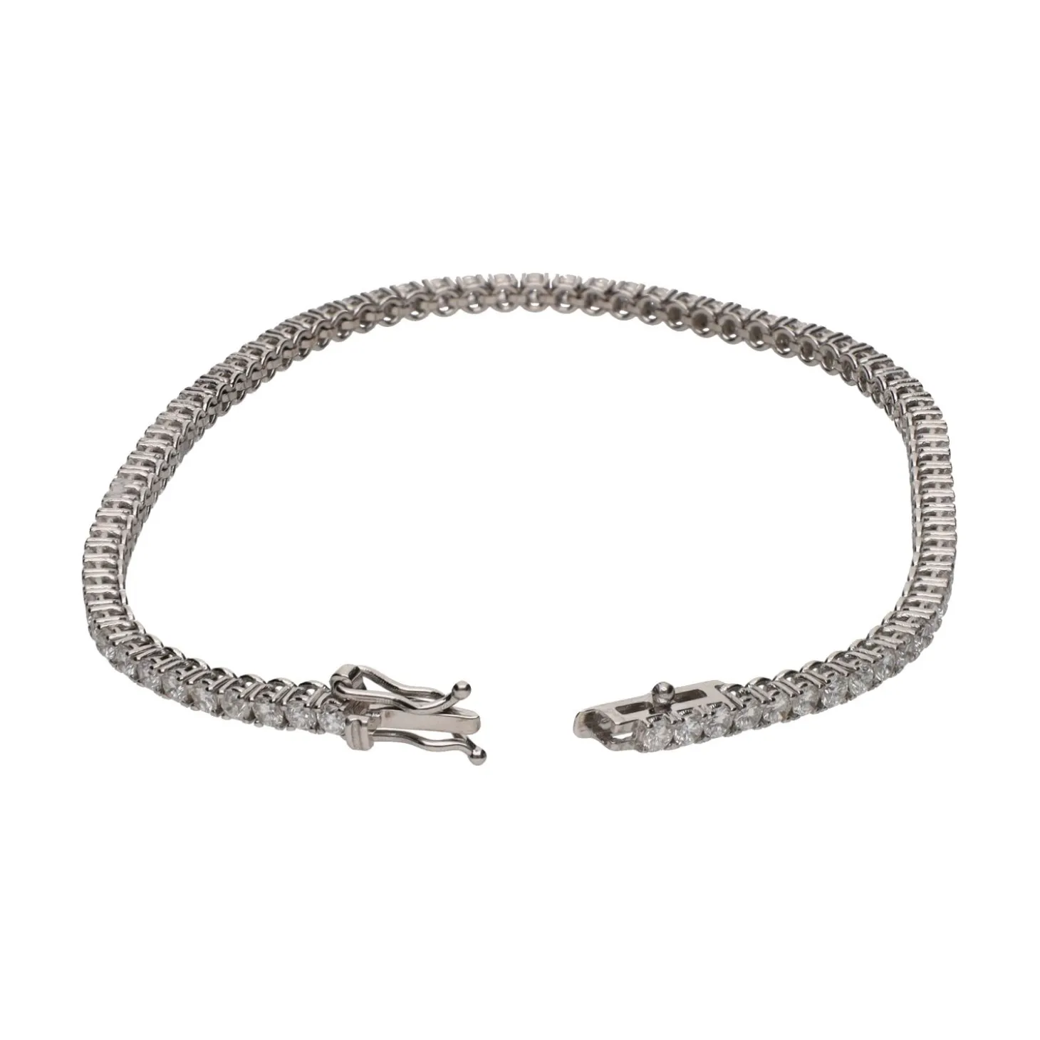 PULSERAS Pulsera riviere en oro blanco con brillantes.
