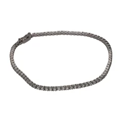 PULSERAS Pulsera riviere en oro blanco con brillantes.
