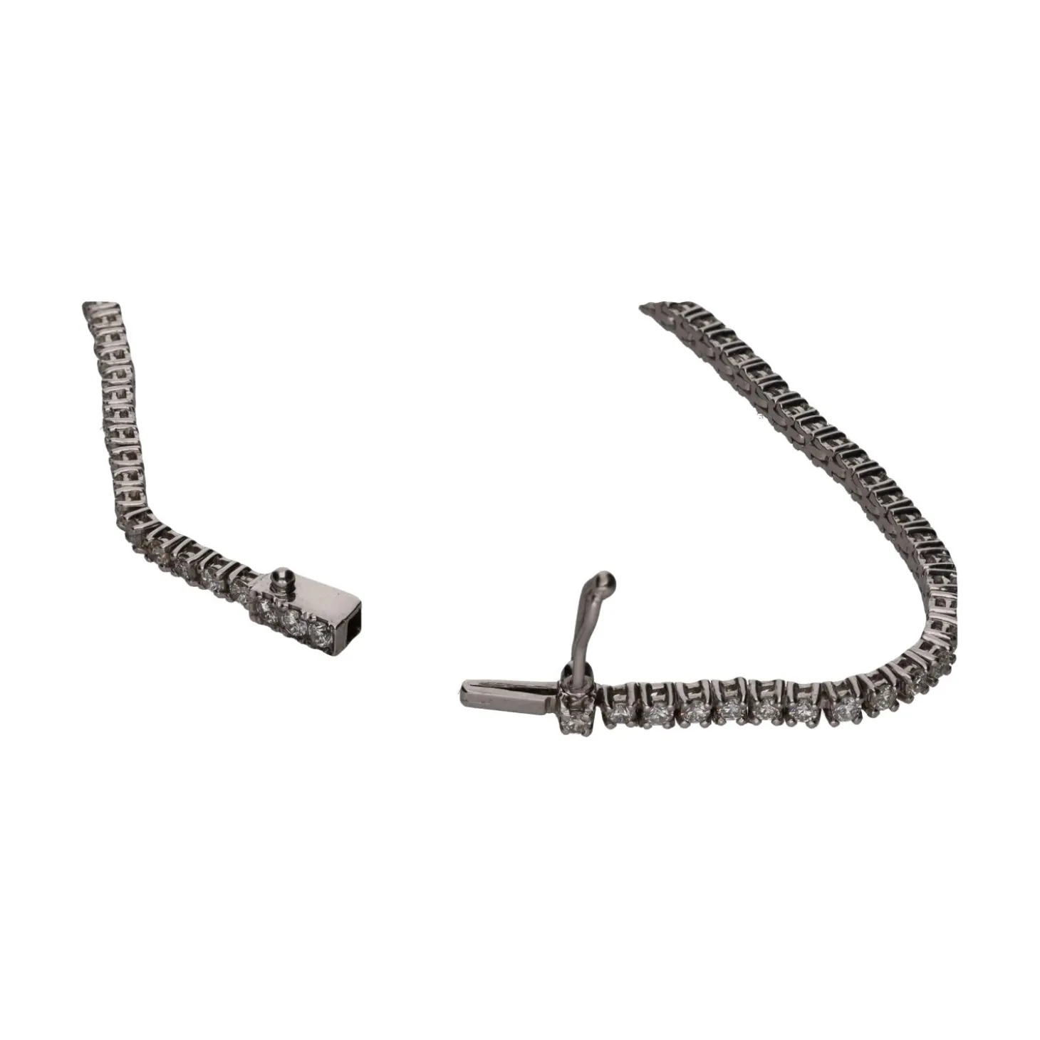 PULSERAS Pulsera riviere en oro blanco con brillantes.