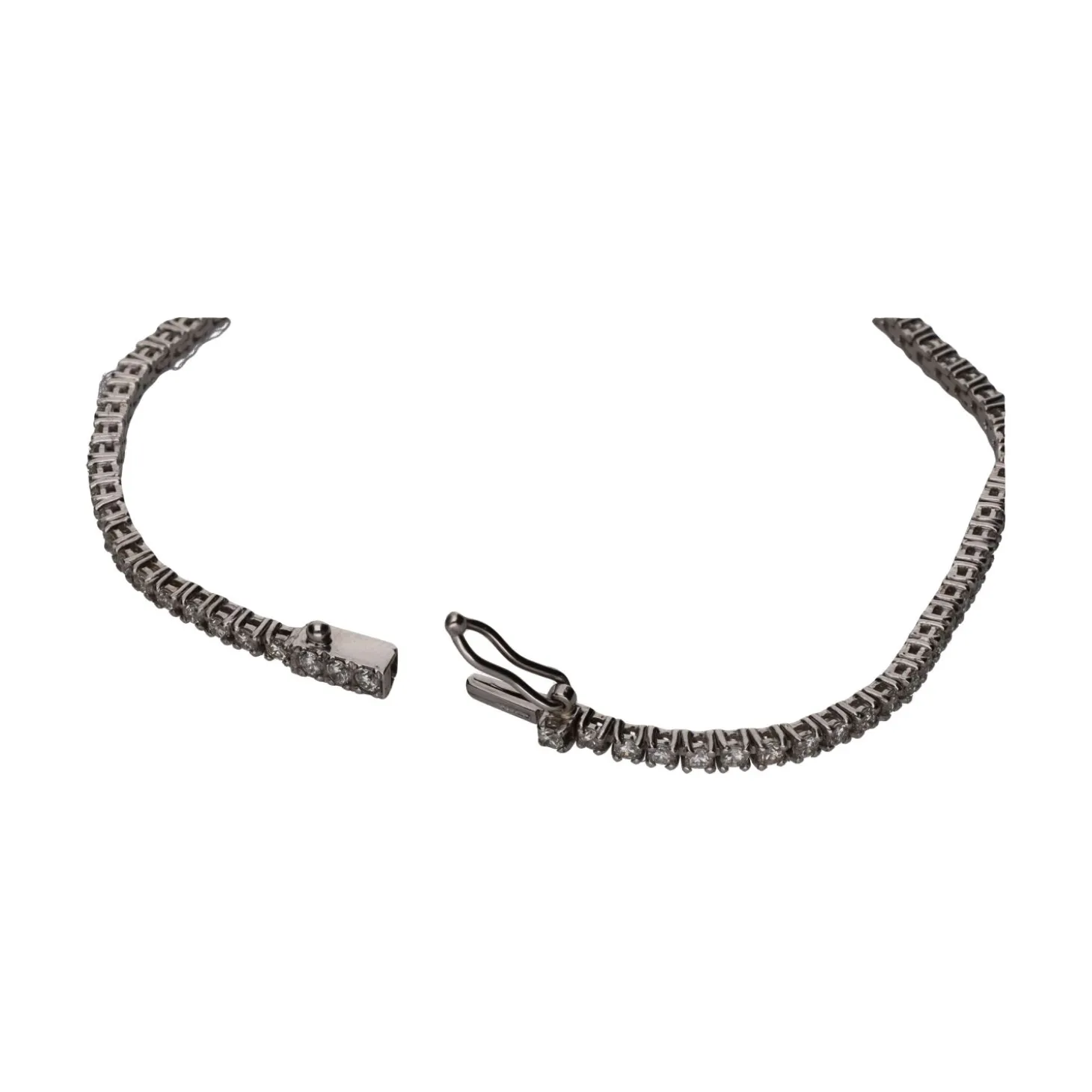 PULSERAS Pulsera riviere en oro blanco con brillantes.