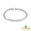 PULSERAS Pulsera riviere en oro blanco con brillantes.