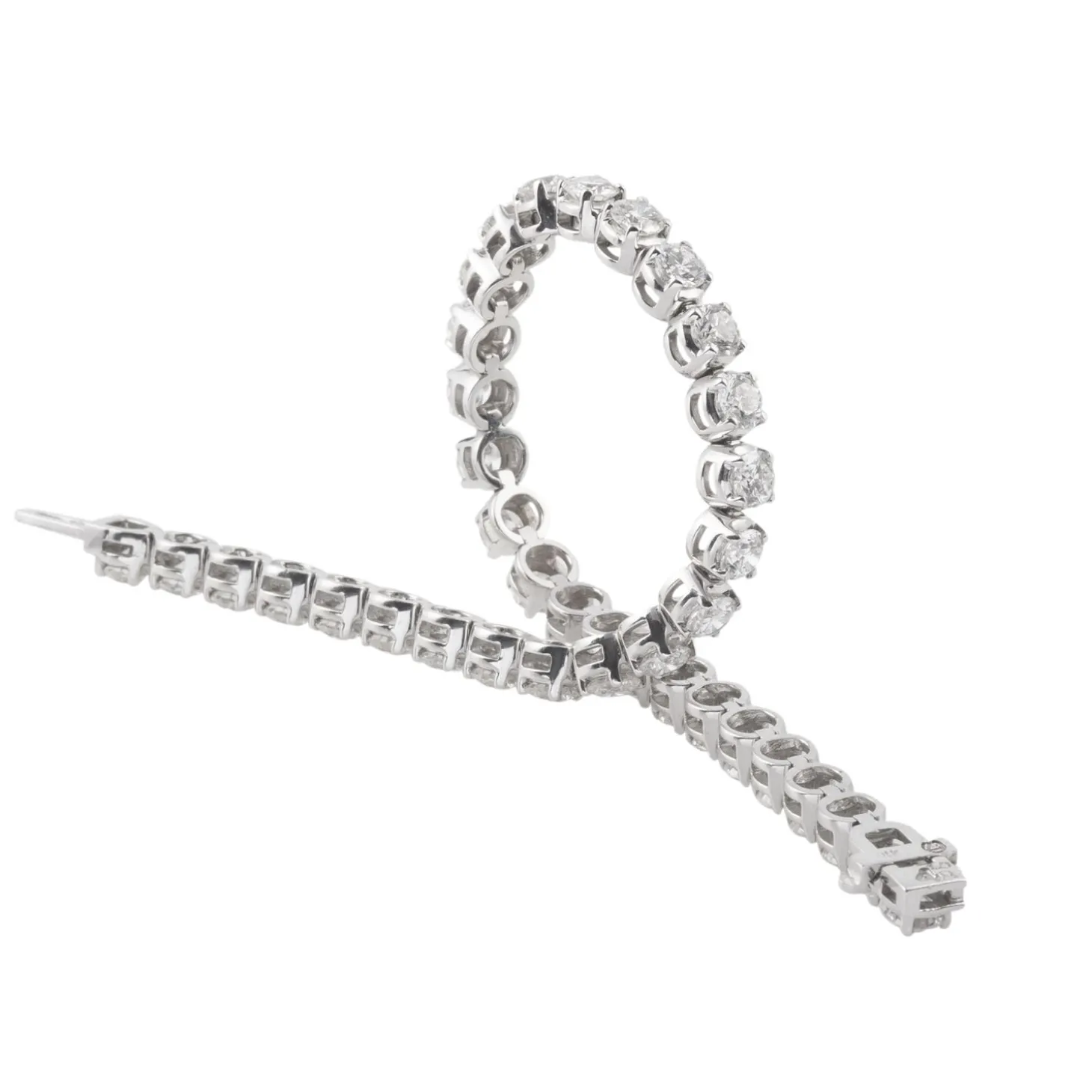 PULSERAS Pulsera riviere en oro blanco con brillantes.