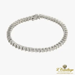 PULSERAS Pulsera riviere oro blanco y diamantes.