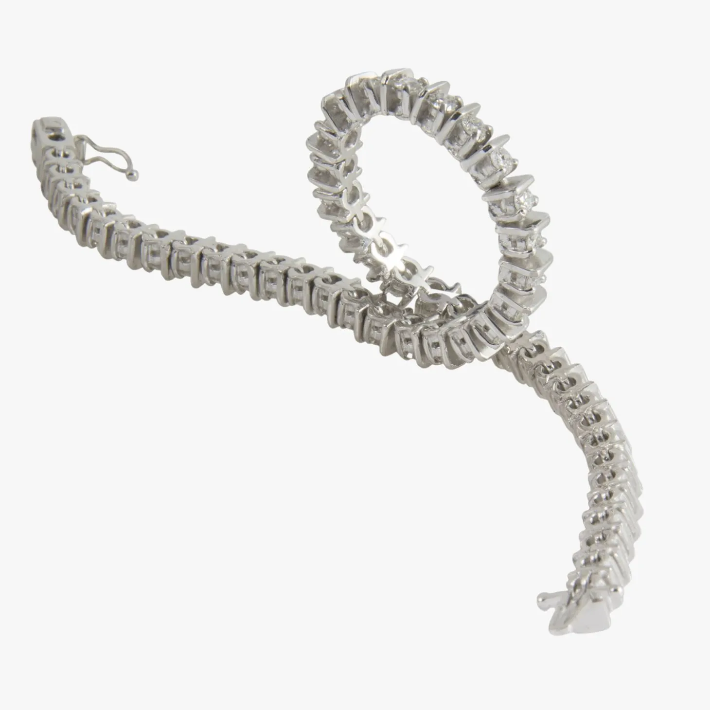 PULSERAS Pulsera riviere oro blanco y diamantes.