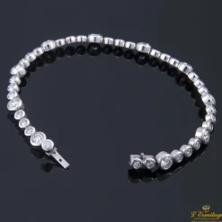 PULSERAS Pulsera riviere oro blanco y diamantes.