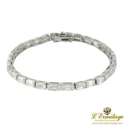 PULSERAS Pulsera riviere oro blanco y diamantes talla esmeralda.