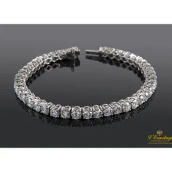 PULSERAS Pulsera riviere oro blanco y diamantes.