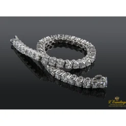 PULSERAS Pulsera riviere oro blanco y diamantes.