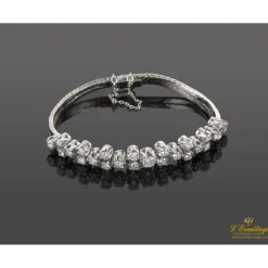 PULSERAS Pulsera semirrígida oro blanco y diamantes.